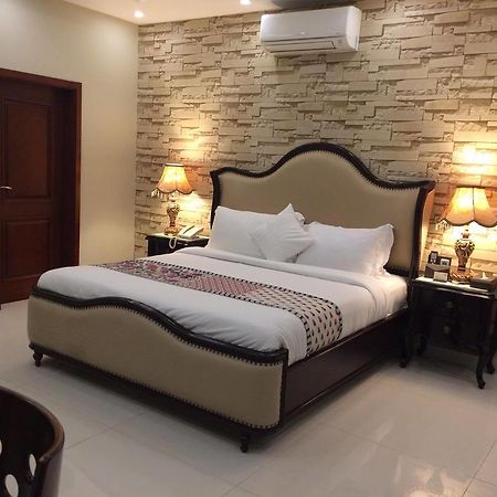 Orchards Cottage Hotel การาจี ภายนอก รูปภาพ