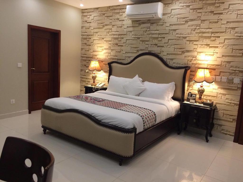 Orchards Cottage Hotel การาจี ภายนอก รูปภาพ