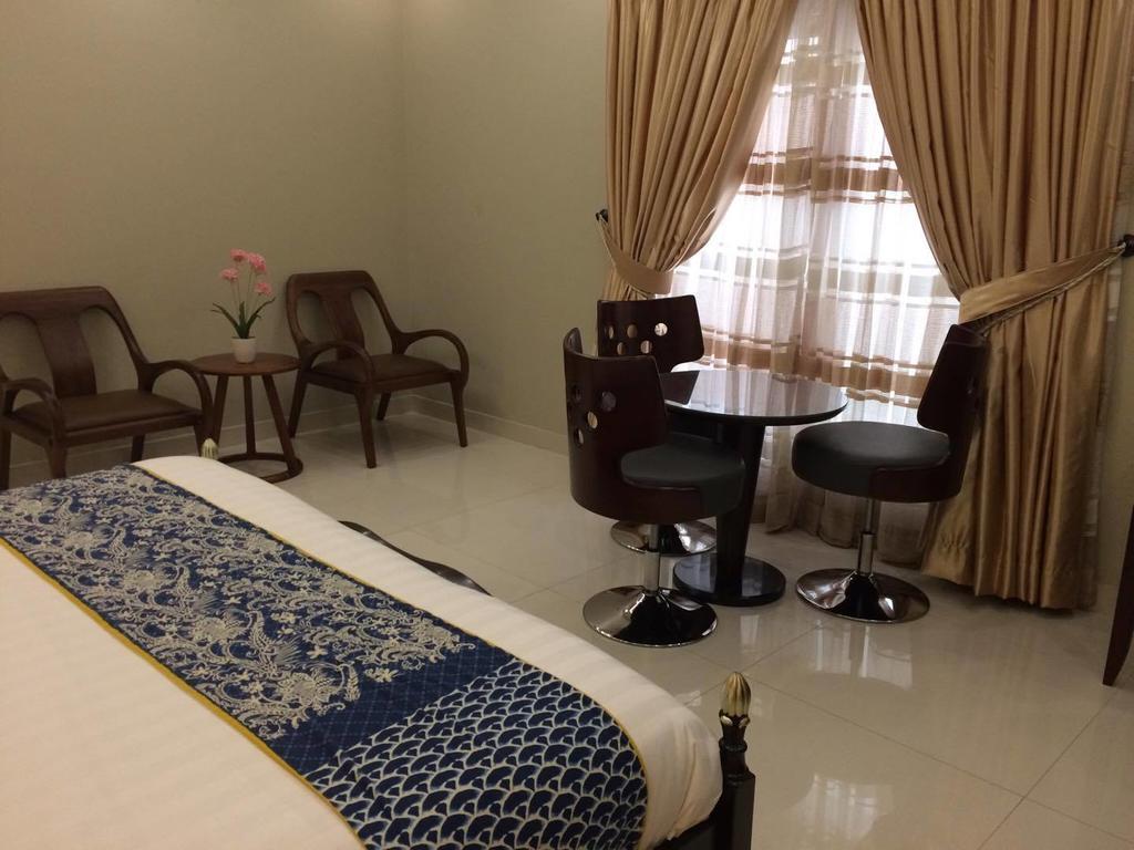 Orchards Cottage Hotel การาจี ภายนอก รูปภาพ