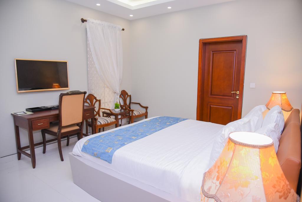 Orchards Cottage Hotel การาจี ภายนอก รูปภาพ