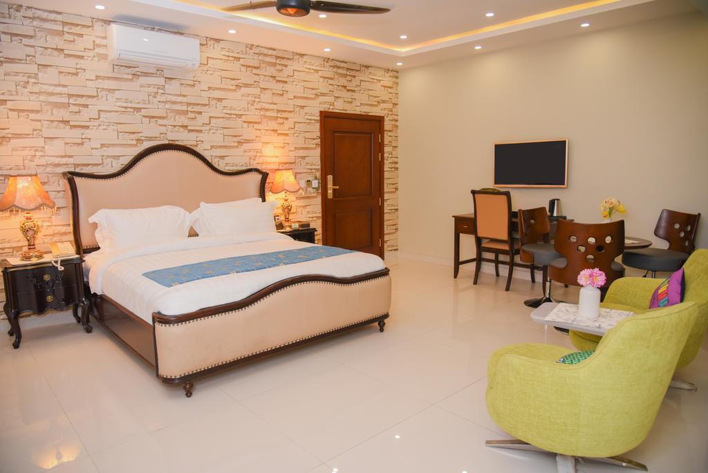 Orchards Cottage Hotel การาจี ภายนอก รูปภาพ