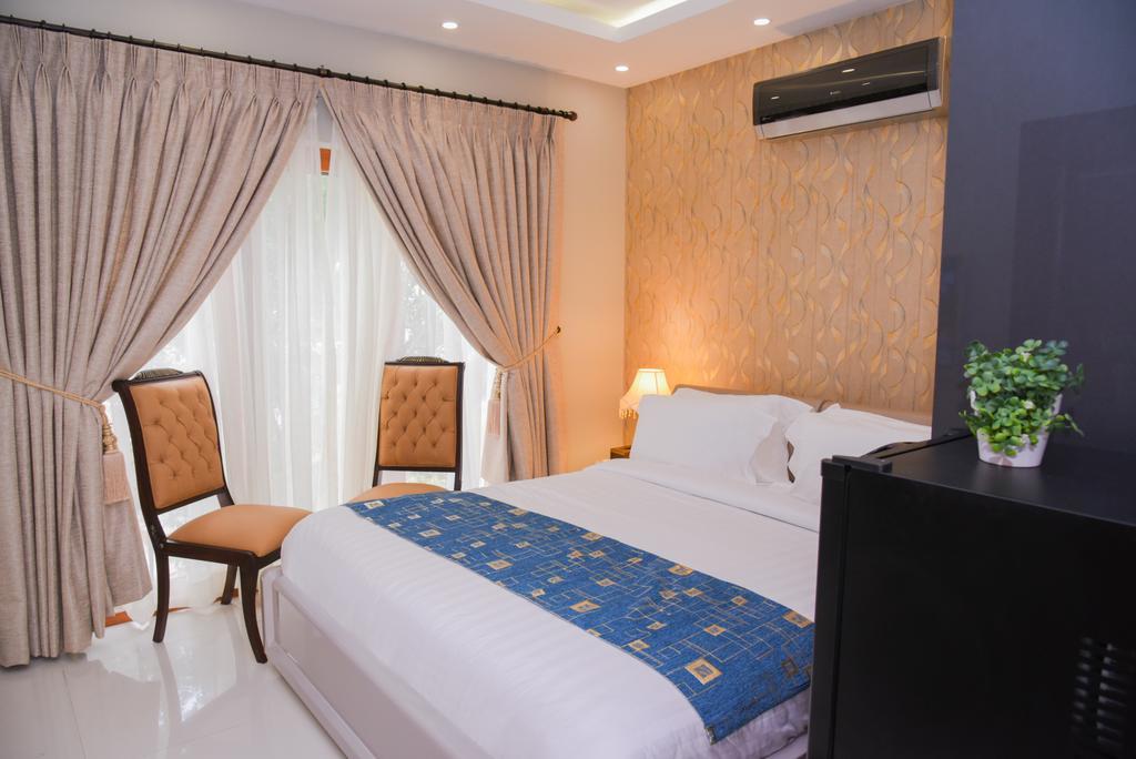 Orchards Cottage Hotel การาจี ภายนอก รูปภาพ