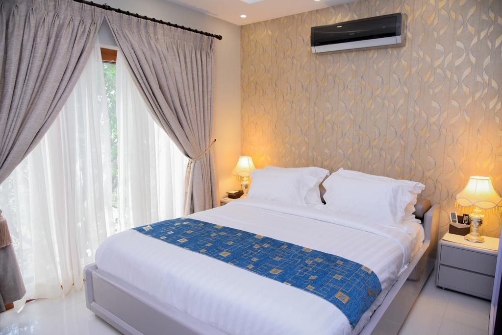 Orchards Cottage Hotel การาจี ภายนอก รูปภาพ