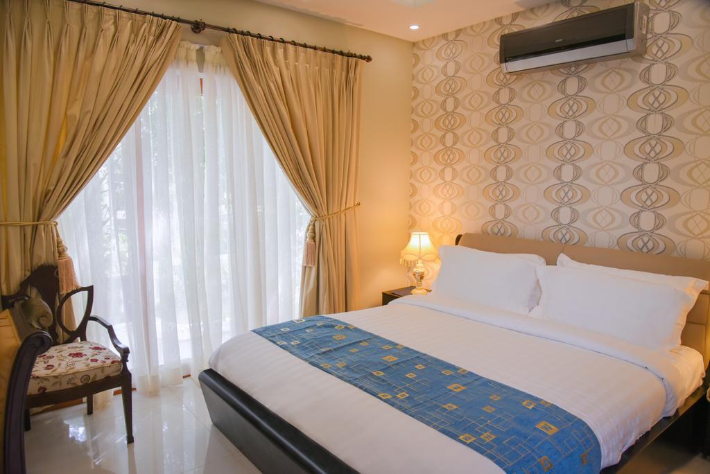 Orchards Cottage Hotel การาจี ภายนอก รูปภาพ