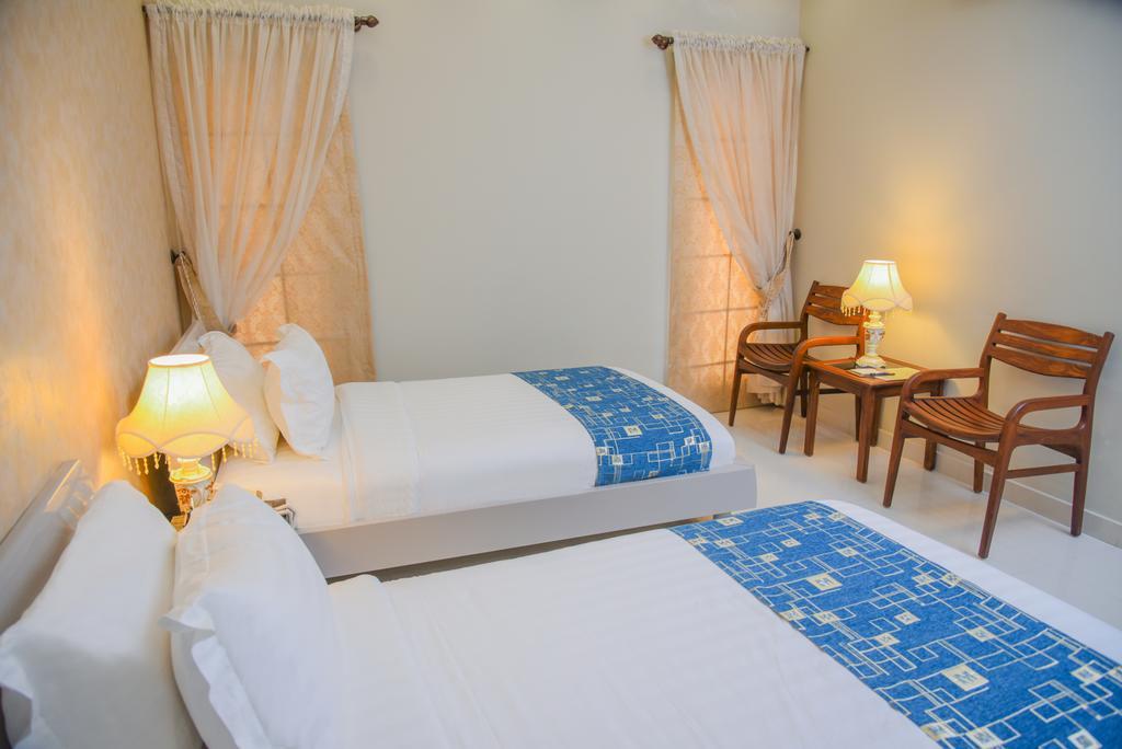 Orchards Cottage Hotel การาจี ภายนอก รูปภาพ