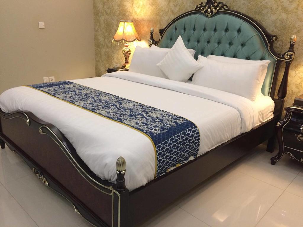 Orchards Cottage Hotel การาจี ภายนอก รูปภาพ