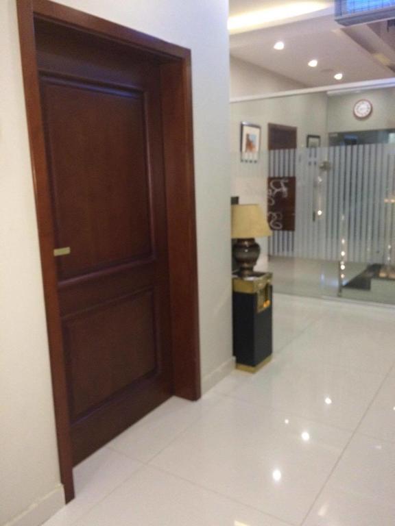 Orchards Cottage Hotel การาจี ภายนอก รูปภาพ